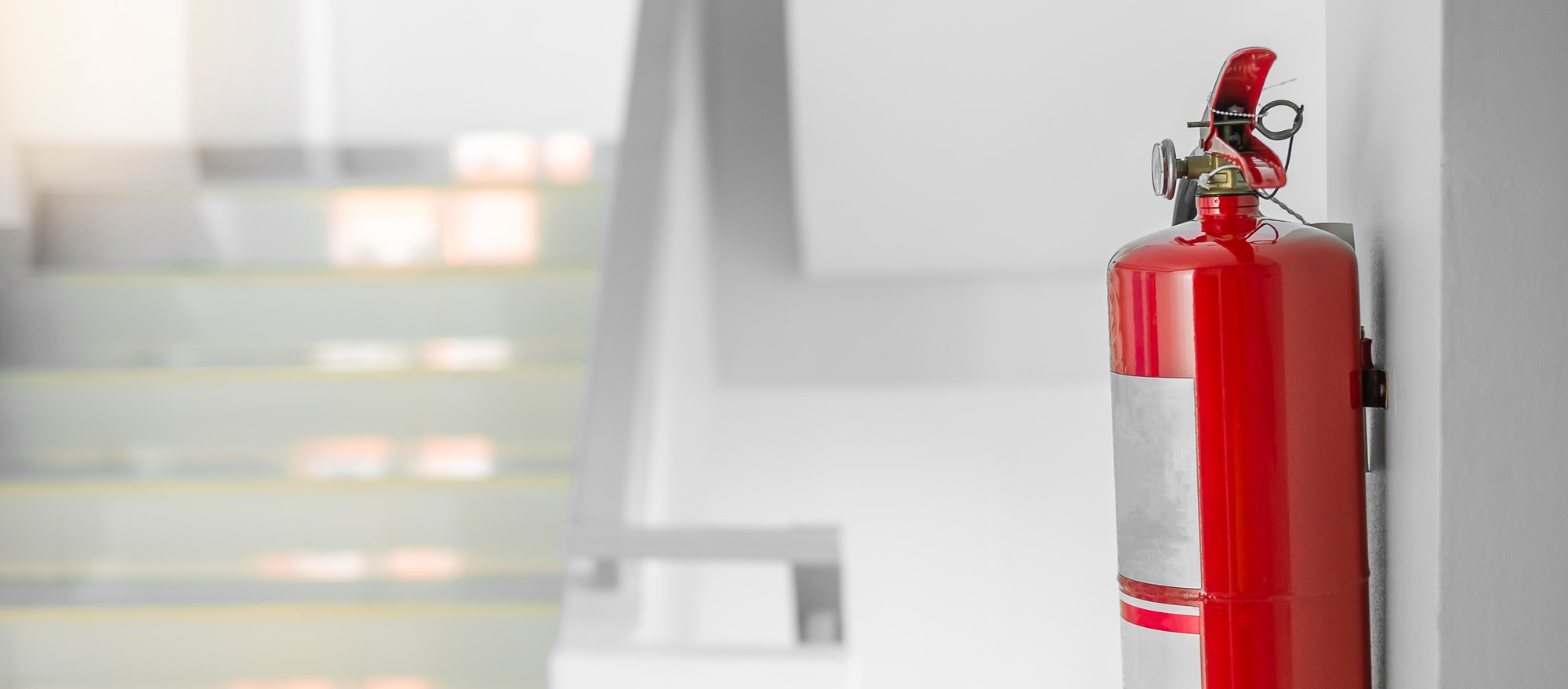 Fire extinguisher system on the wall background,